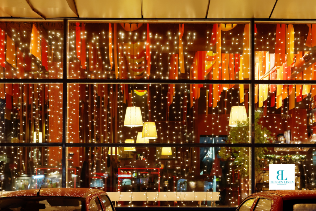 Look into a holiday themed restaurant with pretty lights hanging