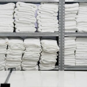 Inventory of hospitality linens such as bed sheets, towels, and more.