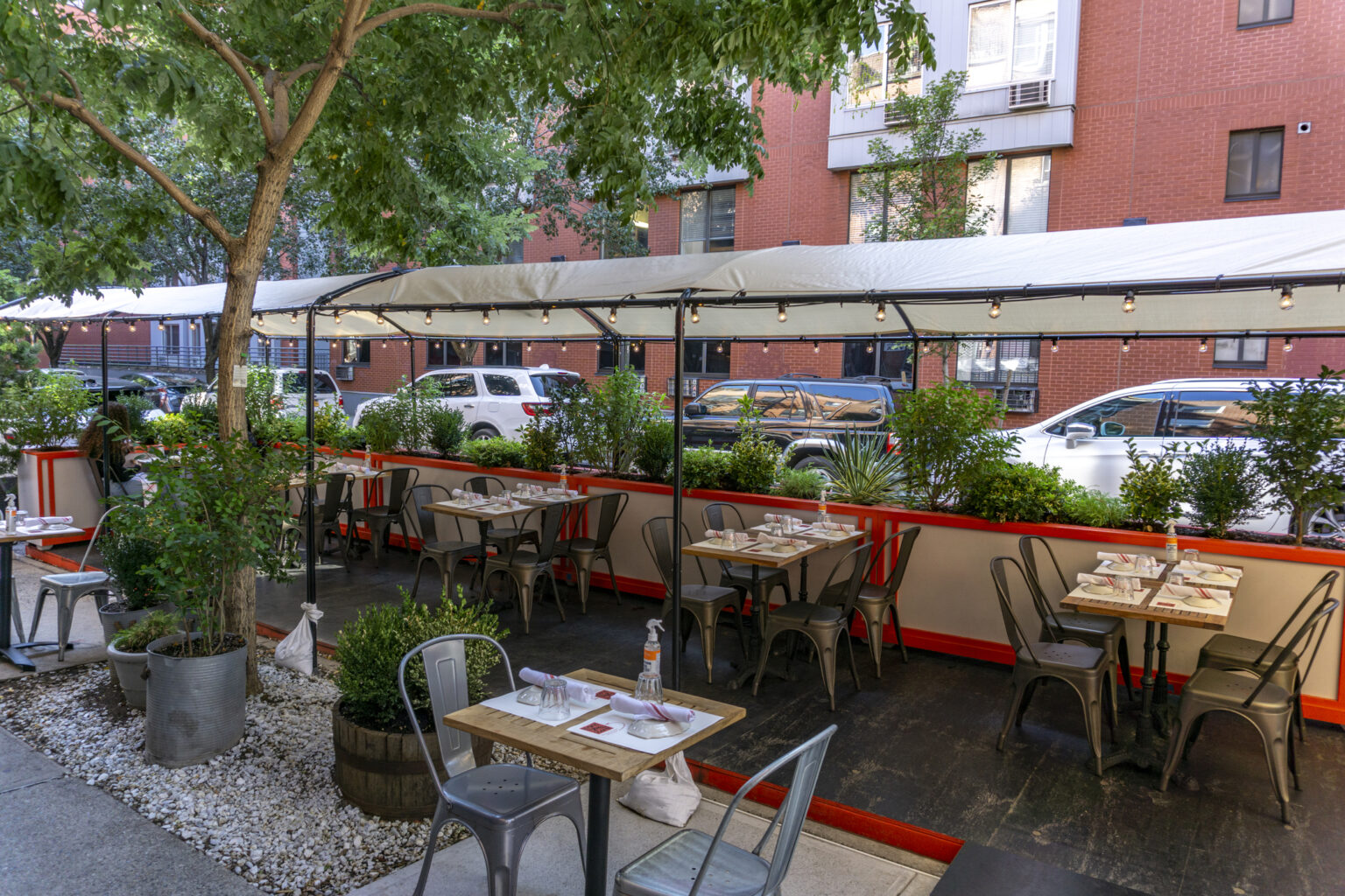 Outdoor restaurant with tables on a New York street